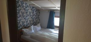 Postel nebo postele na pokoji v ubytování Bed & Breakfast Der Tiroler