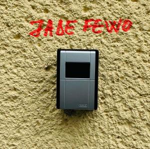 aeper attached to the side of a wall with the words zgang korea at Jade FeWo Cottbus Apartment mit Parkplatz in Cottbus