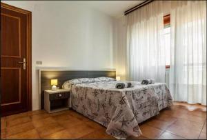 Katil atau katil-katil dalam bilik di House Via Manzoni