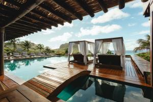 A piscina localizada em Pousada Maravilha ou nos arredores