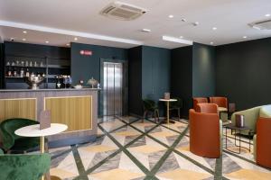 Area soggiorno di Hotel Carlton