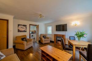 Et tv og/eller underholdning på Acorn Apartment 1