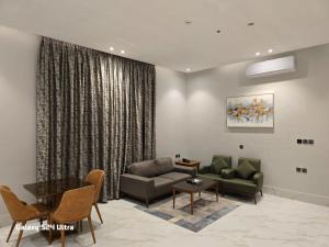 Area soggiorno di Namar Home Serviced Apartment - Tuwaiq 
