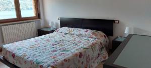A bed or beds in a room at holiday on the island