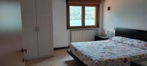 A bed or beds in a room at holiday on the island