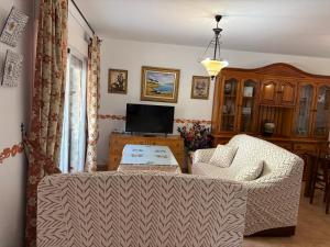A television and/or entertainment centre at Casa Isabel