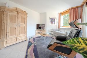 TV a/nebo společenská místnost v ubytování Casa Cresta C32 by Arosa Vacations