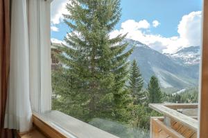 Nespecifikovaný výhled na hory nebo výhled na hory při pohledu z apartmánu + 33 fotografií