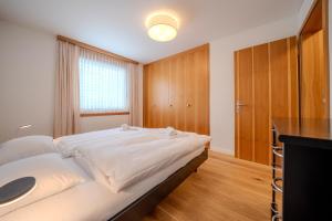 Postel nebo postele na pokoji v ubytování Casa Cresta C32 by Arosa Vacations