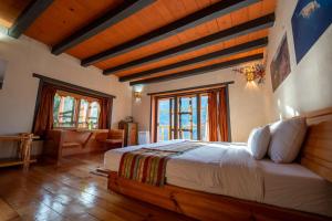 Wangdue Ecolodge客房内的一张或多张床位