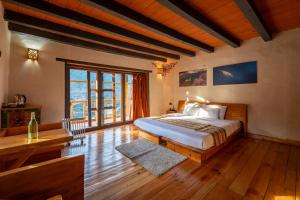 Wangdue Ecolodge客房内的一张或多张床位