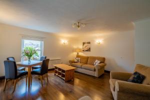 Et opholdsområde på Acorn Apartment 1