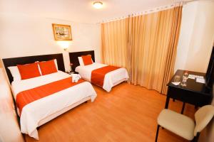 Cama o camas de una habitación en Hotel Montecarlo