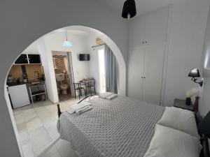 Postel nebo postele na pokoji v ubytování Studios Zafiri