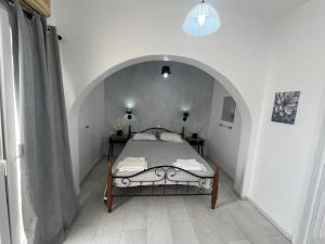 Postel nebo postele na pokoji v ubytování Studios Zafiri