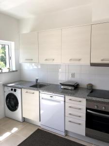 Kuchyň nebo kuchyňský kout v ubytování Apt H - Beach Village + 21 fotografií