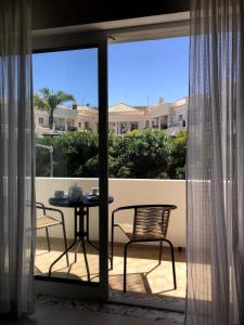 Balkón nebo terasa v ubytování Apt H - Beach Village