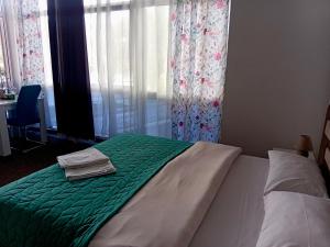 Postel nebo postele na pokoji v ubytování Apartmani Helena
