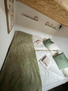 Postel nebo postele na pokoji v ubytování Tiny Home Kontík