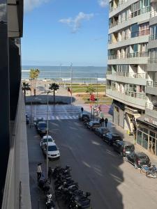 a group of motorcycles parked on a street next to a building at Joli Studio with Seaview 16 in Casablanca