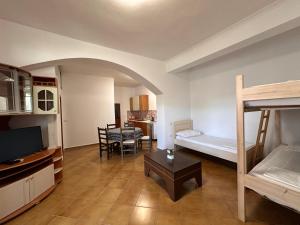 Postel nebo postele na pokoji v ubytování Blue Apartments
