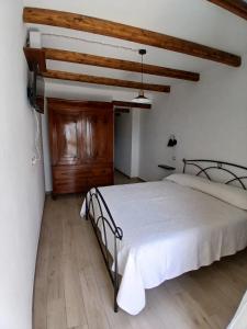 Postel nebo postele na pokoji v ubytování Monte Longu