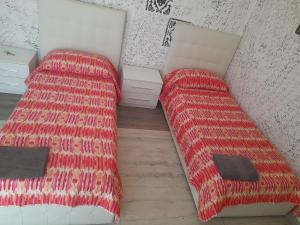 A bed or beds in a room at Casa vacanze D&A mono