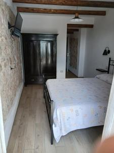 Postel nebo postele na pokoji v ubytování Monte Longu