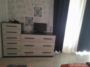 A television and/or entertainment centre at Casa vacanze D&A mono
