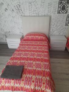 A bed or beds in a room at Casa vacanze D&A mono