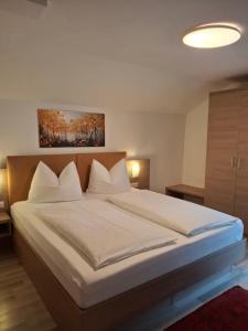 Posteľ alebo postele v izbe v ubytovaní Apart Ritzl