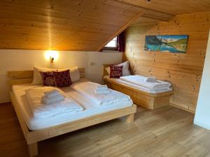 Postel nebo postele na pokoji v ubytování Der Waidachhof Zillertal