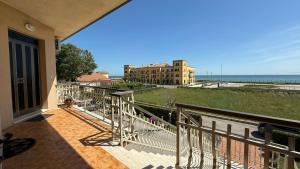 a balcony with a view of the ocean at PP07 - Porto Potenza, trilocale vista mare con aria condizionata in Porto Potenza Picena