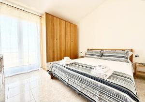 Φωτογραφία από το άλμπουμ του Pgs Immobiliare srls Bellavista Maria Attico con vista mare e parcheggio privato La Maddalena σε La Maddalena