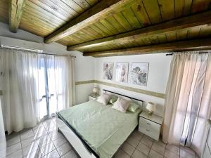 Postel nebo postele na pokoji v ubytování House on the beach + 37 fotografií