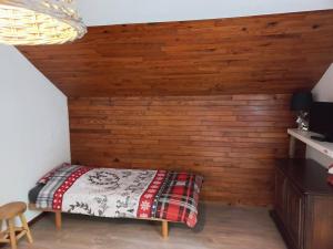Postel nebo postele na pokoji v ubytování Les Sapins