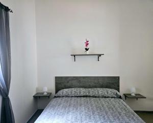 Ένα ή περισσότερα κρεβάτια σε δωμάτιο στο Camping Ulisse Calabria +123 φωτογραφίες