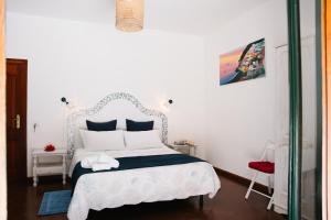 Postel nebo postele na pokoji v ubytování B&b DORMIDAME'