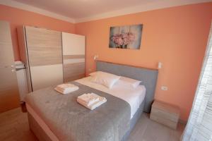 Postel nebo postele na pokoji v ubytování Apartment Ana