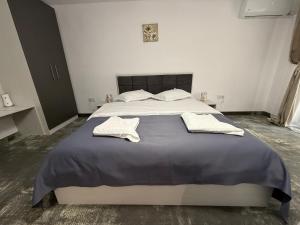 Postel nebo postele na pokoji v ubytování BAM Hotel