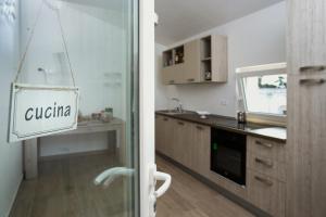 Kuchyň nebo kuchyňský kout v ubytování CASA 801