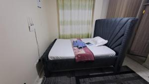 Ένα ή περισσότερα κρεβάτια σε δωμάτιο στο Sweet B home