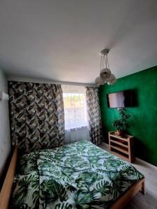 Posteľ alebo postele v izbe v ubytovaní Apartament Strzyza Castle - Definicja Luksusu