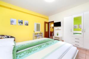 Postel nebo postele na pokoji v ubytování Apartments Erik B&B Adults only