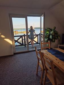 Balkón alebo terasa v ubytovaní Pensjonat Rybaczówka - noclegi, restauracja, port