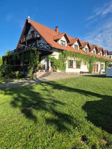 Vonkajšia záhrada v ubytovaní Pensjonat Rybaczówka - noclegi, restauracja, port + 37 fotografií