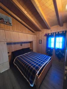 Voodi või voodid majutusasutuse Ciapin House toas