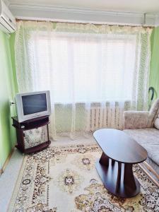 Μια τηλεόραση ή/και κέντρο ψυχαγωγίας στο Квартира верх проспекта Александра Поля
