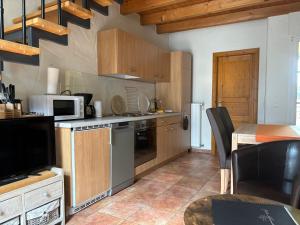 Kuchyň nebo kuchyňský kout v ubytování Ferienwohnung Zur Scheune