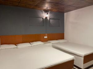 Postel nebo postele na pokoji v ubytování Selagala Resort